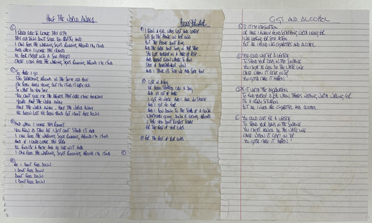 Three sets of Oasis handwritten lyrics to auction for £6,000